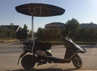 一种电动车遮阳挡雨蓬 专利转让